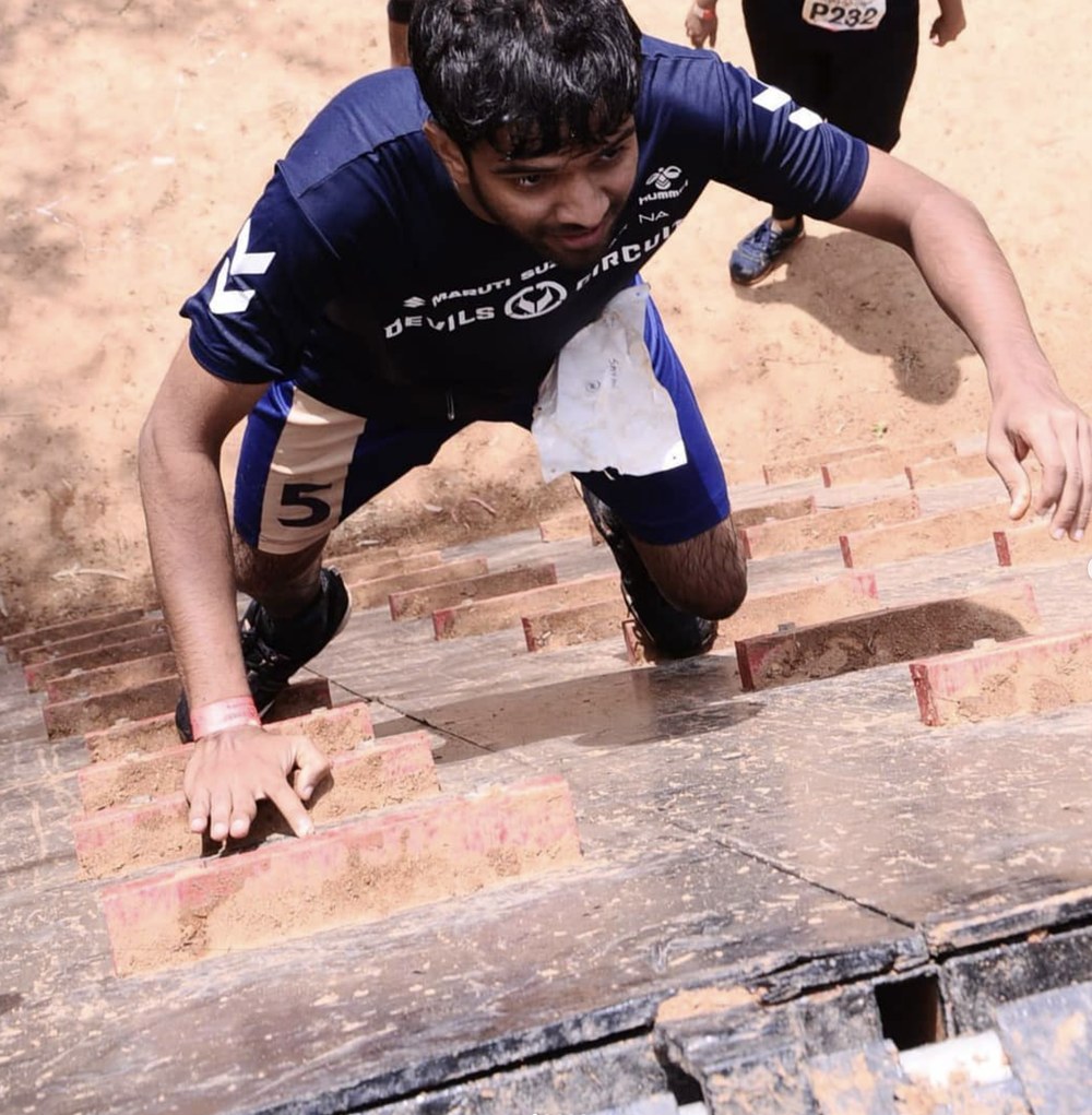 Savan crawling through an obstacle at Devil's Circuit, Bangalore